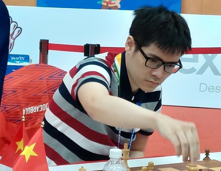 Lê Tuấn Minh tại chung kết cờ chớp cá nhân gặp Lê Quang Liêm, ở SEA Games 31 tại Quảng Ninh hôm 20/5. Ảnh: A.T