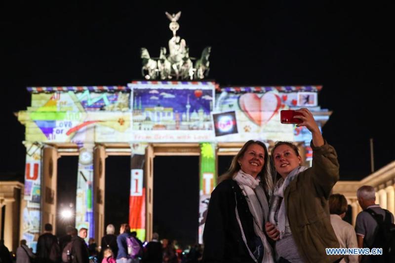 Khách du lịch ở Berlin, Đức. Ảnh: Xinhua